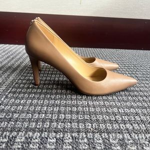 Practically new Michael Kors pumps! Size 10. Worn twice (too small)